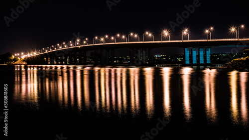 Bridge at night with reflections