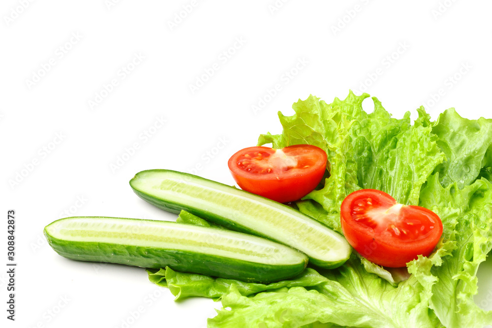 A set of ingredients for green salad on a white background A set of ingredients for green salad on a white background