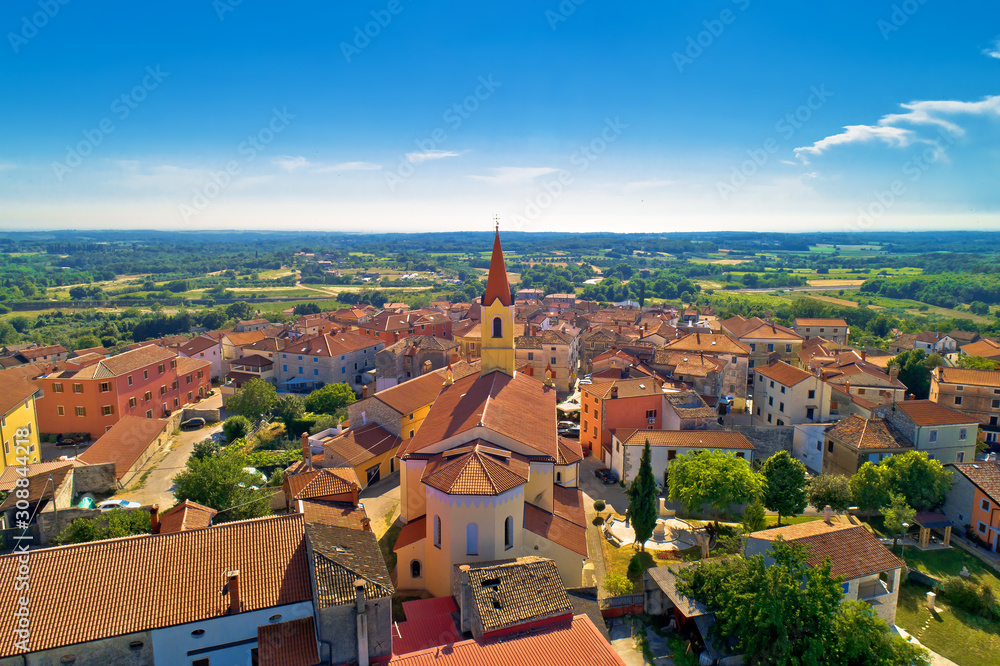 Istria. Town of Brtonigla on green istrian hill aerial view