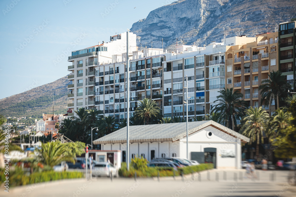 Fototapeta premium Beautiful street view of Denia, Marina Alta with harbor and skyline, Montgo mountain, beach and city, province of Alicante, Valencia, Spain