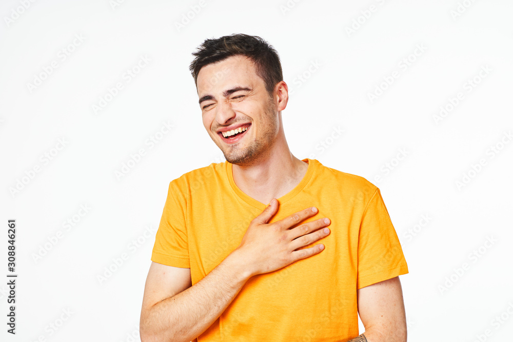 portrait of young man with arms crossed portrait of young man with arms crossed