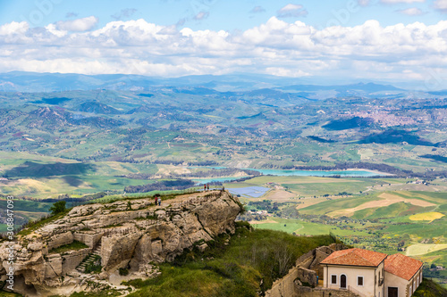 Picturesque green hilly valley near Enna city, Sicily, Italy. Nicoletti Lake and Leonforte town on the background. Aerial view from Castello di Lombardia photo