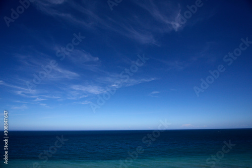 The azure blue ocean is a peaceful and beautiful Pacific sea level © Konlon