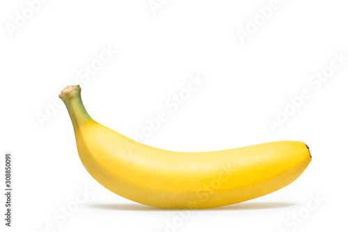 A banana stands alone on white background