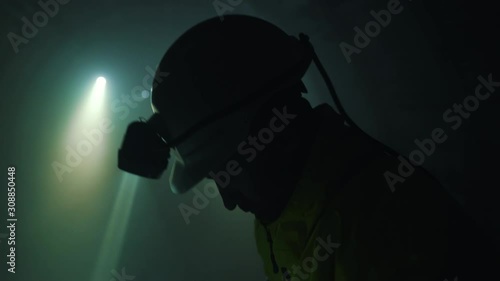 miner works with a drill