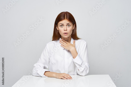 portrait of young woman sitting on sofa