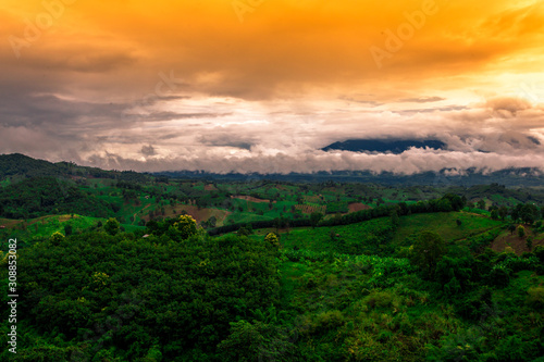 Blurred abstract background of high angle scenery  overlooking mountains  colorful skies  fresh air while traveling