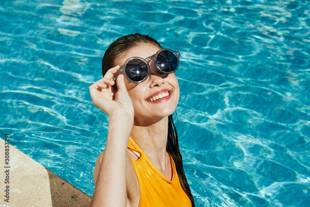 woman in black goggles in swimming pool woman in black goggles in swimming pool