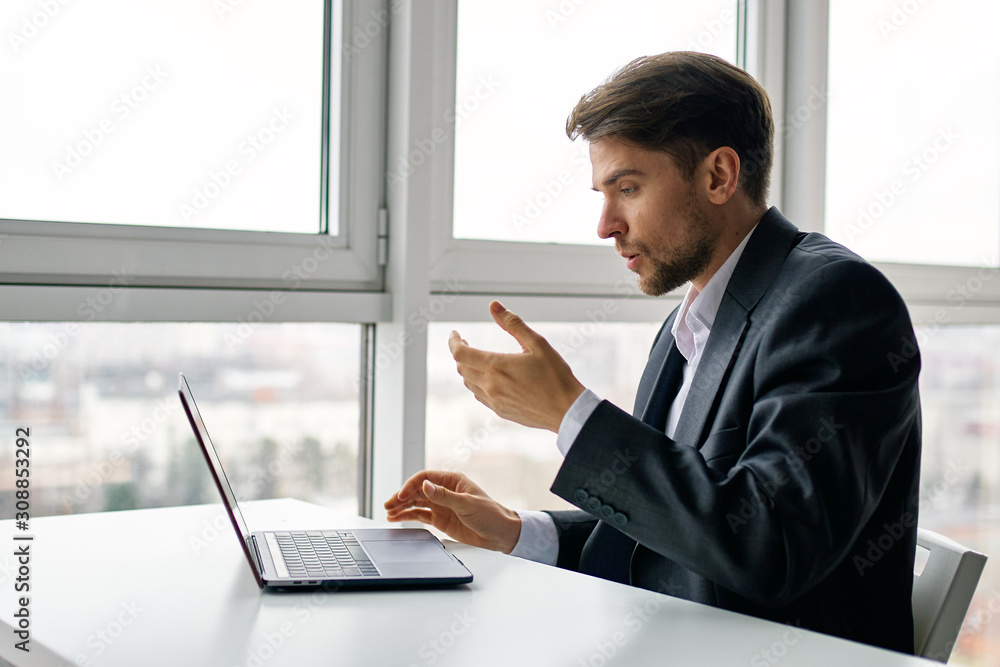 businessman working on laptop in office businessman working on laptop in office