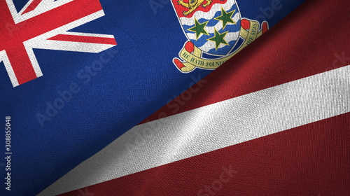 Fototapeta Naklejka Na Ścianę i Meble -  Cayman Islands and Latvia two flags textile cloth, fabric texture