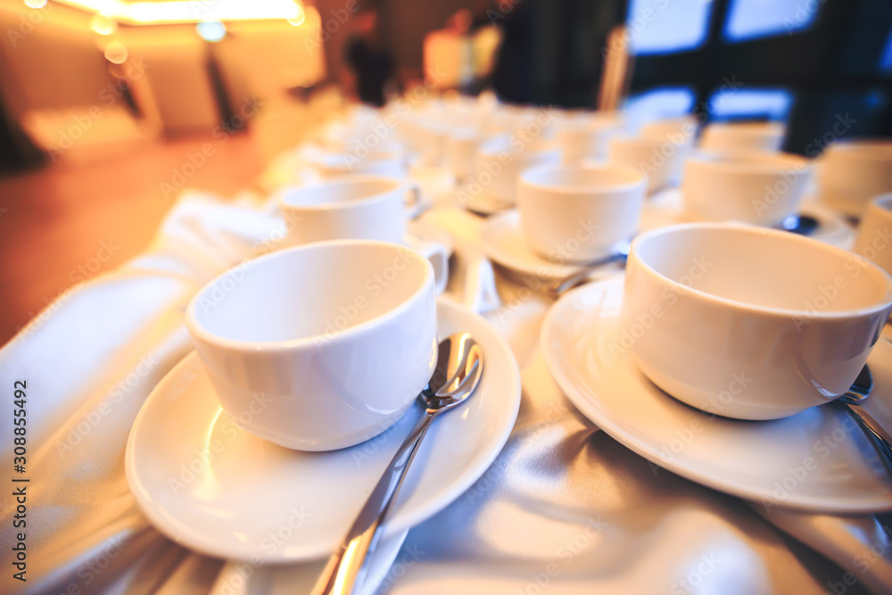 Cup of coffee are on the table in the hotel. Cup of coffee are on the table in the hotel.