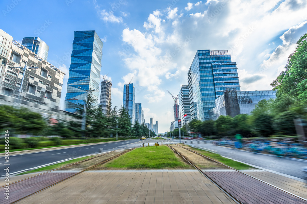 Fototapeta premium city road through modern buildings in nanjing