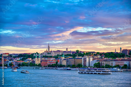 The Buda side of Budapest, Hungary along the Danube River at sunset.