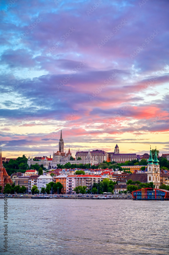 The Buda side of Budapest, Hungary along the Danube River at sunset.