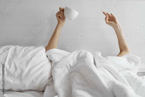 woman waking up in bed