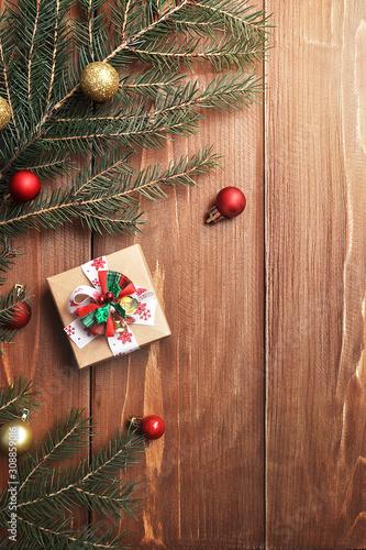 Christmas decor and gift on wooden background