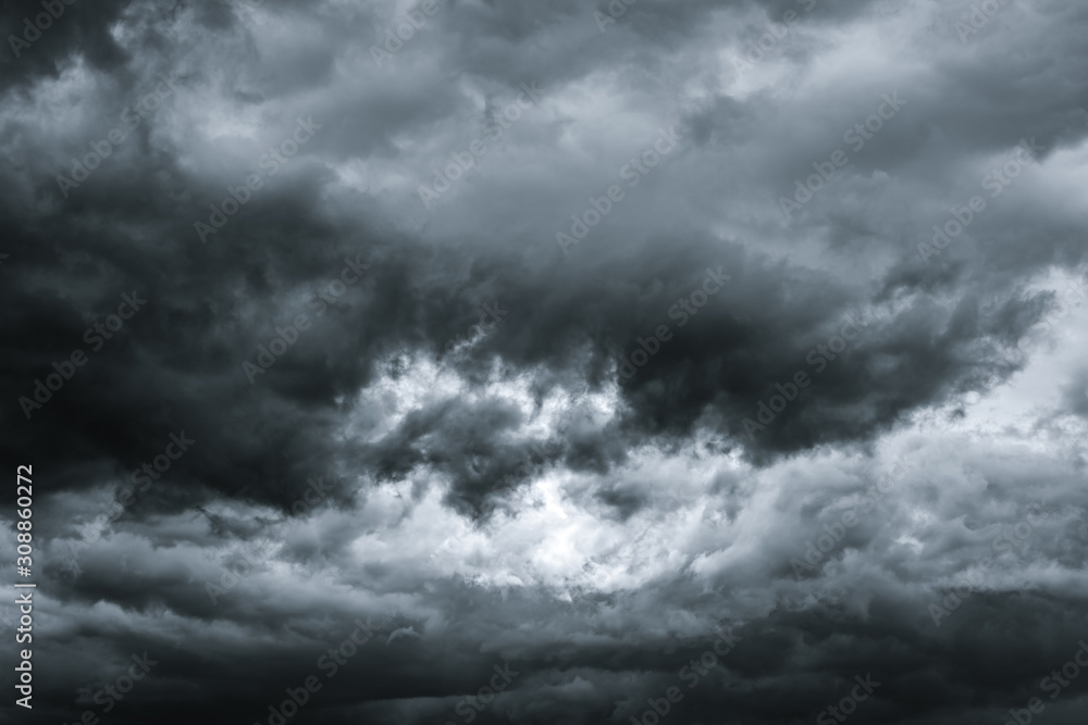 Dark dramatic sky and clouds. Background for death and sad concept. Gray sky and fluffy white clouds. Thunder and storm sky. Sad and moody sky. Nature background. Dead abstract background. Cloudscape. Dark dramatic sky and clouds. Background for death and sad concept. Gray sky and fluffy white clouds. Thunder and storm sky. Sad and moody sky. Nature background. Dead abstract background. Cloudscape.