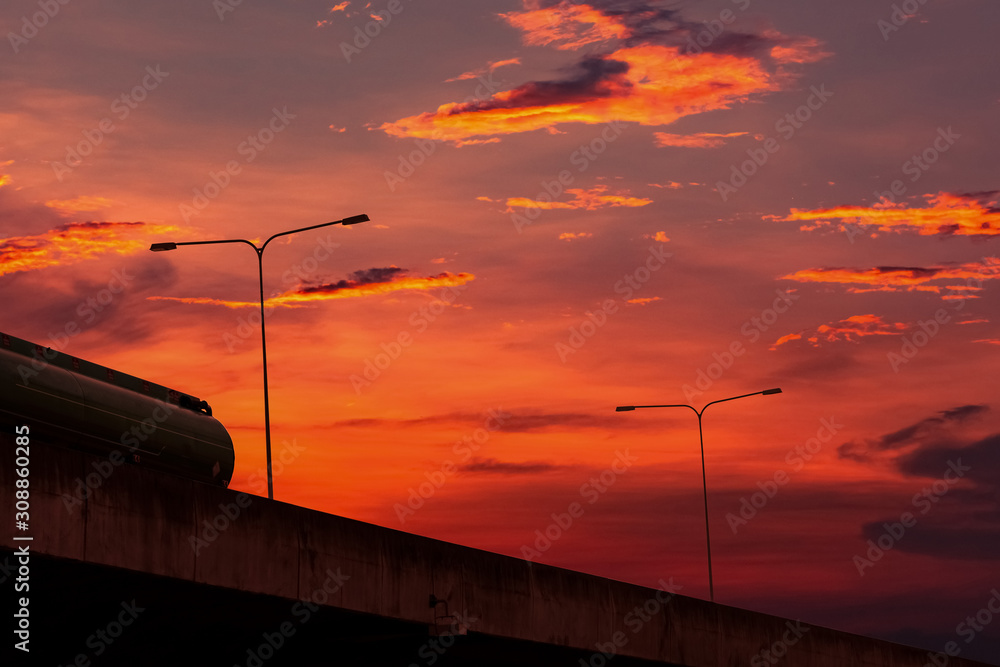 bottom-view-of-elevated-concrete-highway-with-sunset-sky-overpass