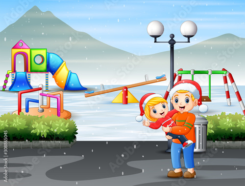 The brothers having fun at the snowy playground