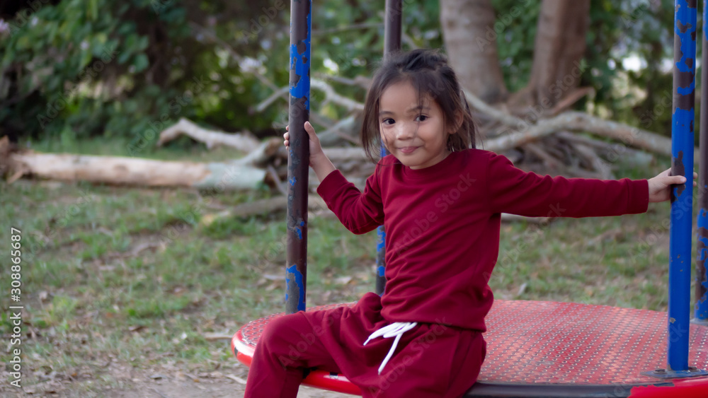 Portrait of Asia girl funny in the playground Portrait of Asia girl funny in the playground