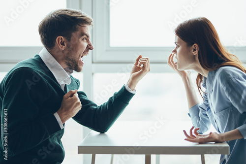 man and woman shaking hands