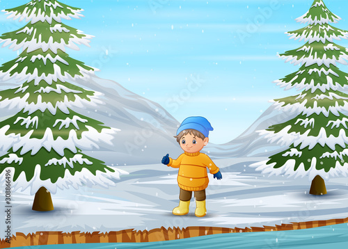 Boy wearing warm jacket and hat in wintertime