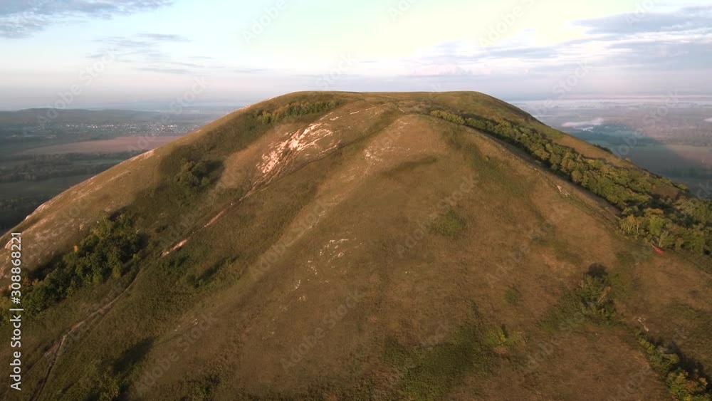 The remain of the reef of the ancient sea, composed of limestone - shikhan Toratau. Aerial view. The remain of the reef of the ancient sea, composed of limestone - shikhan Toratau. Aerial view.