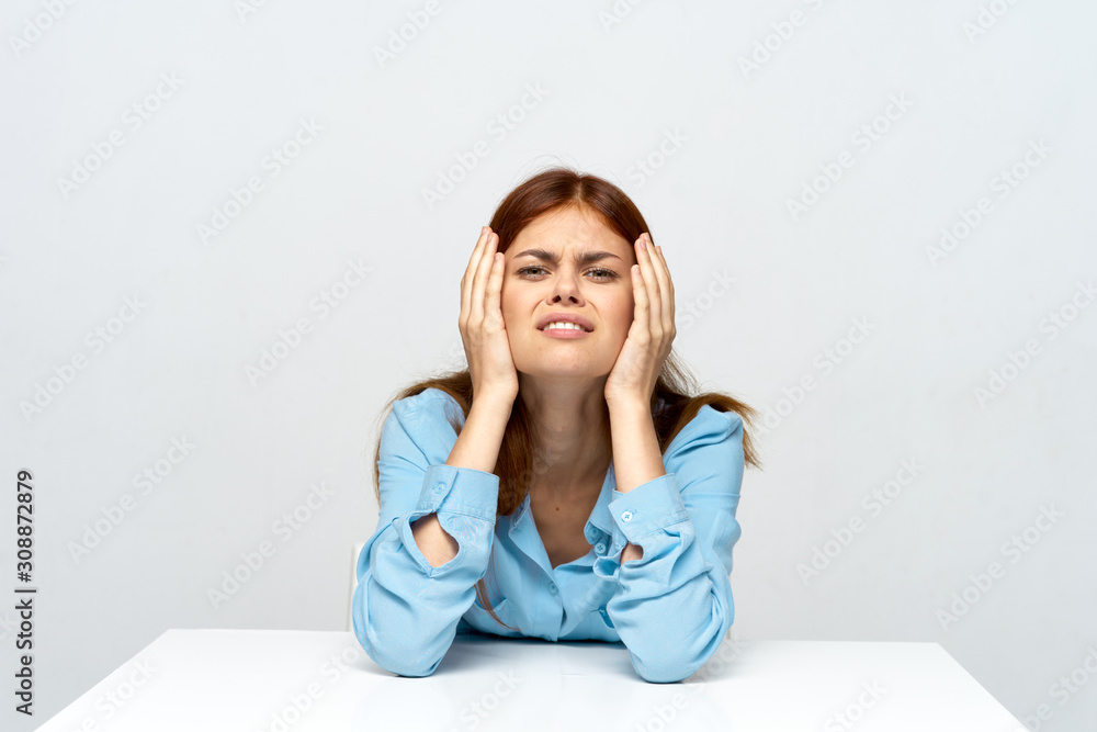 young woman sitting on the floor young woman sitting on the floor