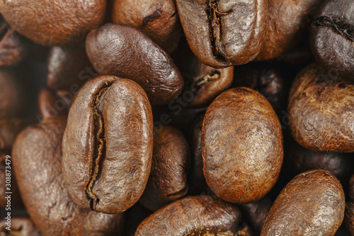 Roasted coffee beans closeup. Background texture. © Lalil