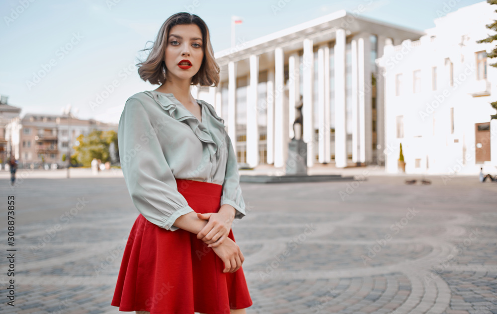 Fototapeta premium portrait of young woman in the city