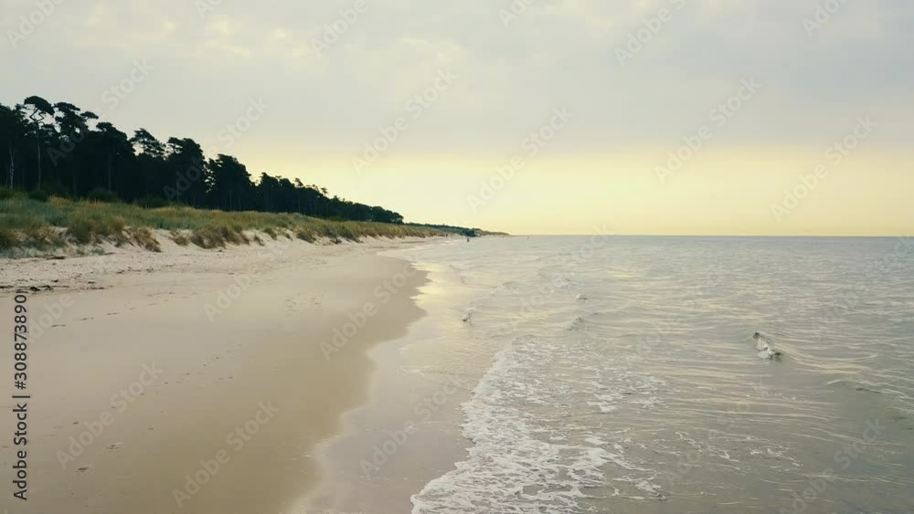 custom made wallpaper toronto digitaldrone flying tight above the water of the baltic sea at the swedish coast in the skane district