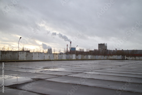 Industrial zone on the outskirts of a big city in autumn © Andrey