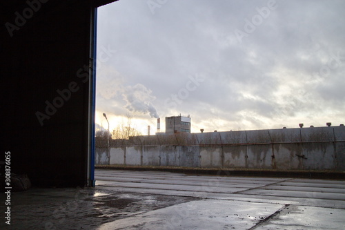 Industrial zone on the outskirts of a big city in autumn