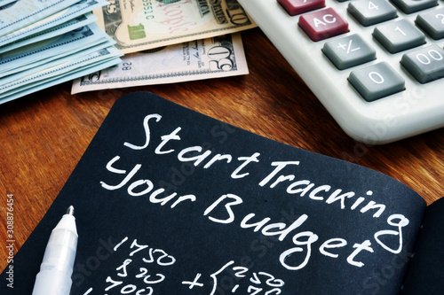 Fototapeta Naklejka Na Ścianę i Meble -  Start tracking your budget sign with home finances calculations.