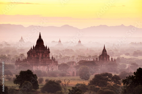 The pagoda landscape with beautiful fog in the morning in Myanmar