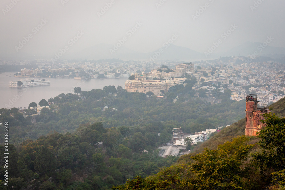 View over the Pichola lake and the city palace of Udaipur from the ropeway, Rajasthan, India