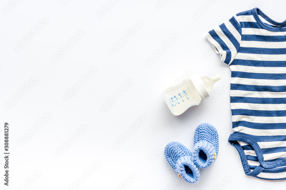 Baby background blue color. Clothes and accessories for newborn boy