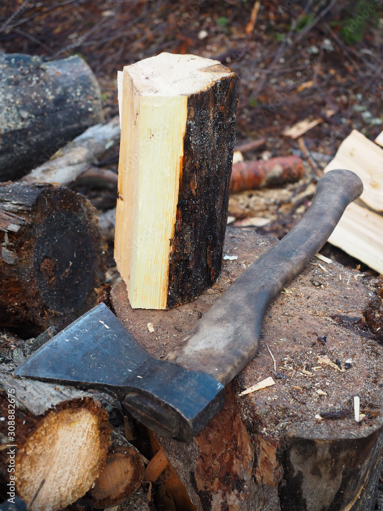 An axe for cutting firewood, commonly found in cold cities An axe for cutting firewood, commonly found in cold cities