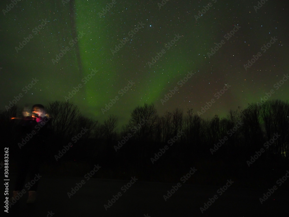 Fototapeta premium Beautiful northern lights on the sky