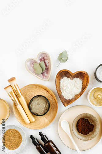 Wallpaper Mural Beauty treatment ingredients for making homemade skin care cosmetic mask. Various bowl with clay, cream, essential oil and natural ingredients  on white table background. Organic spa cosmetic products Torontodigital.ca