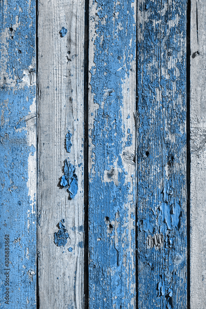 Crackled blue paint on old wood planks. Photo background Crackled blue paint on old wood planks. Photo background