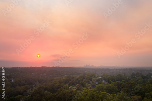 Bush fire smoke haze causes air quality problems over Sydney basin, reducing visibility and increasing risk of asthma and respiratory problems for people