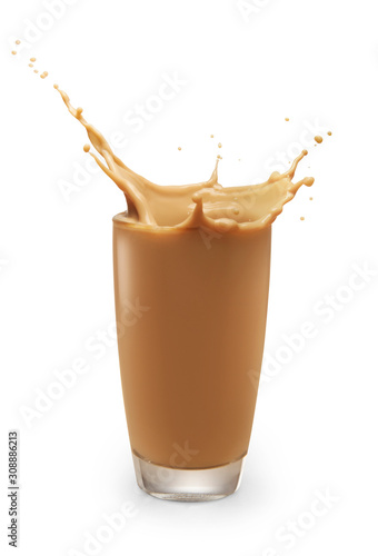 Splash of chocolate milk from the glass on isolated white background