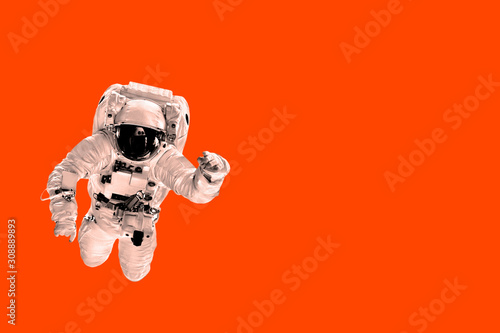 Obraz na plátně astronaut flies over the earth in space.