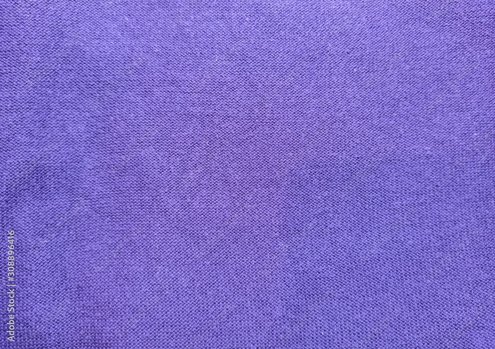 Fototapeta premium Purple cloth texture background. Material for clothes.