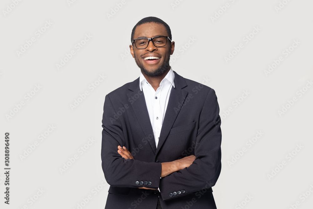 Portrait of happy african american young businessman in formal suit. - obrazy, fototapety, plakaty 