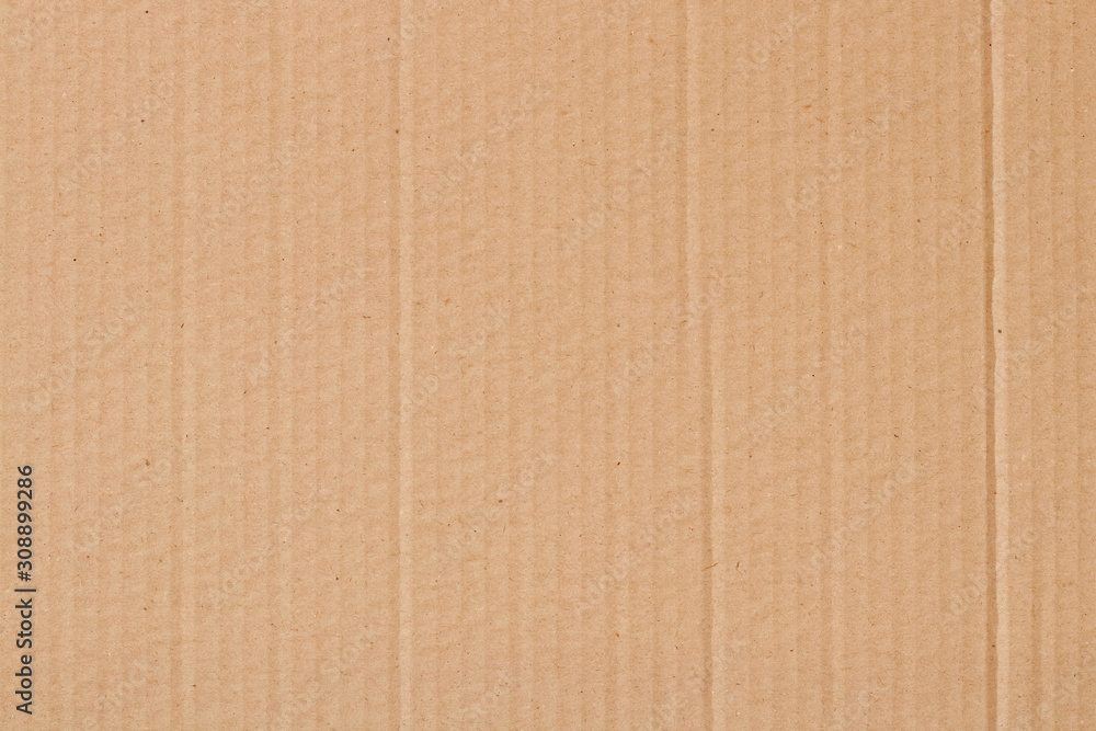 Fototapeta premium Brown cardboard sheet abstract background, texture of recycle paper box in old vintage pattern for design art work.