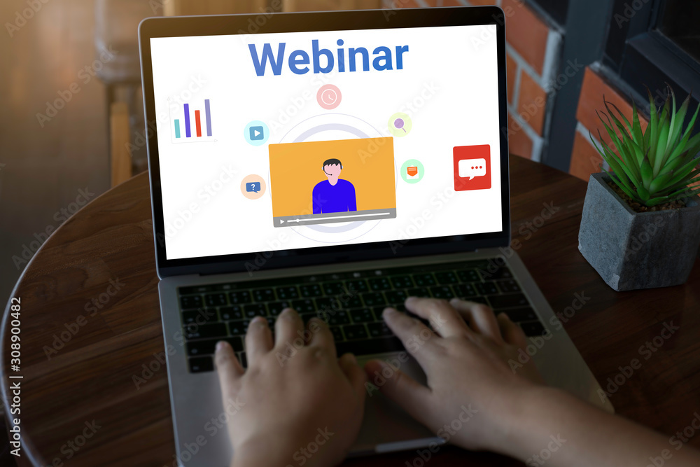 Person using a laptop computer for online training webinars. E-learning browsing connection and cloud online technology webcast concept. Laptop mockup with clipping path on screen. Person using a laptop computer for online training webinars. E-learning browsing connection and cloud online technology webcast concept. Laptop mockup with clipping path on screen.