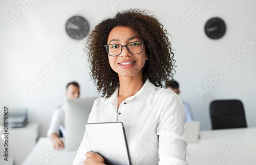 Black business consultant smiling for camera photo