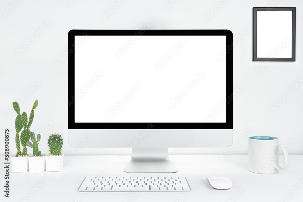 Computer with blank white copy space for text, Mockup design desktop computer in office on white table with keyboard and Coffee cub, Work place concept, Cactus in pot. Computer with blank white copy space for text, Mockup design desktop computer in office on white table with keyboard and Coffee cub, Work place concept, Cactus in pot.